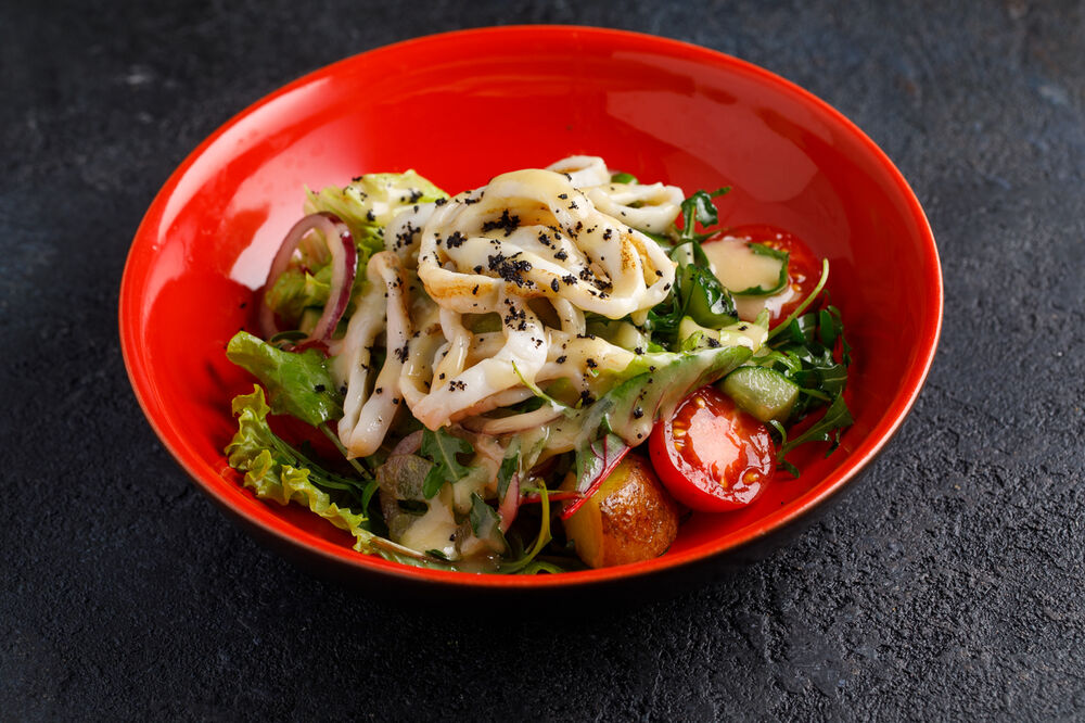 Salad with squid and grill