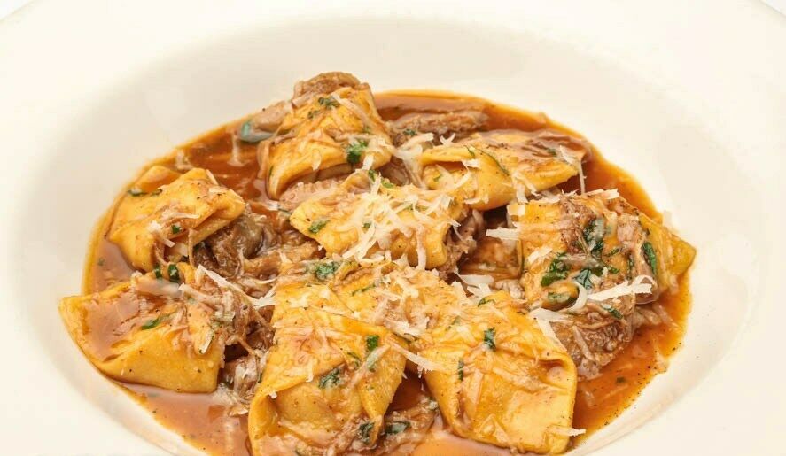 Tortellini with duck stew and pumpkin