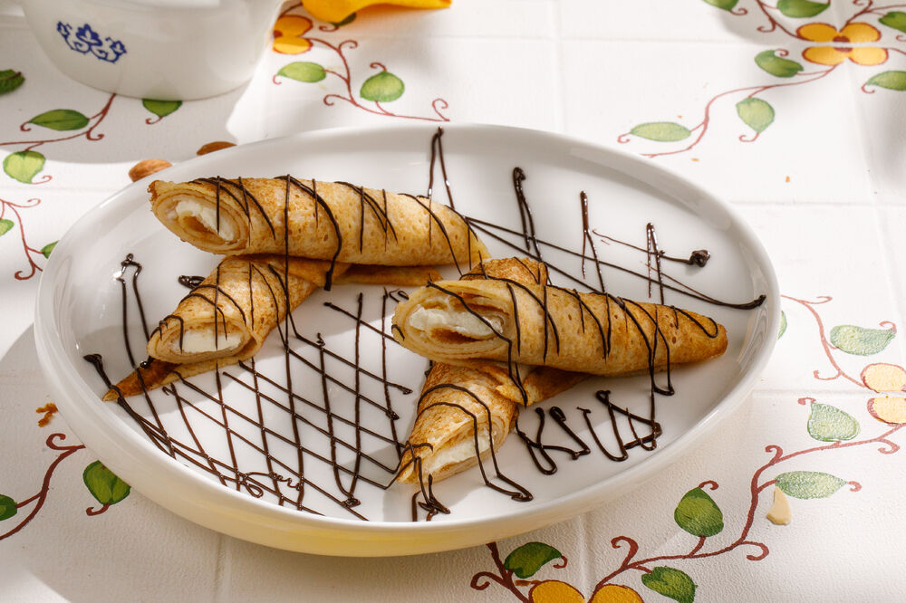 Italian style pancake with maskarpone cream and oranges