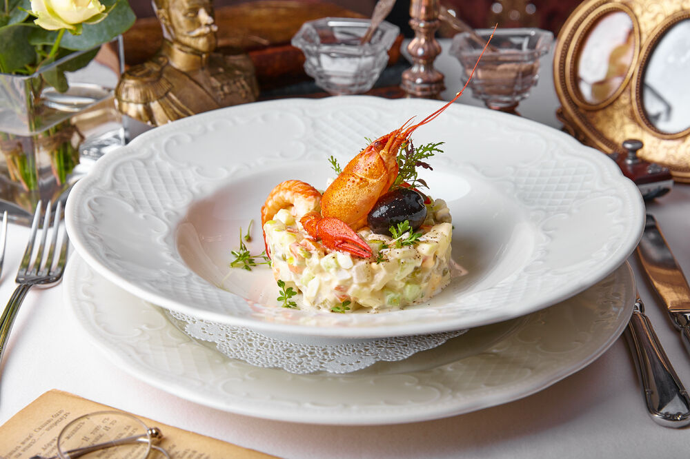 Russian salad with crawfish tail