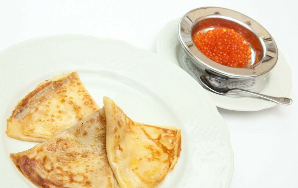 Crepes with red caviar
