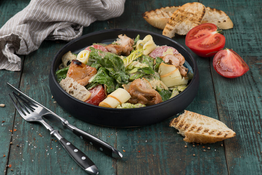 Warm salad with chicken and smoked Suluguni cheese