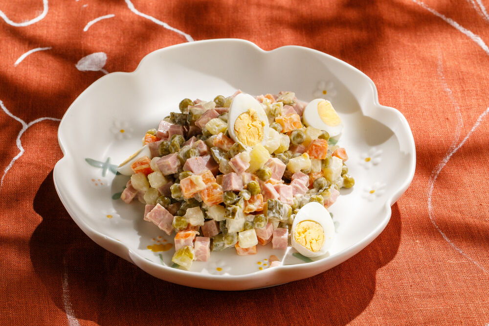 Olivier children's salad with sausage