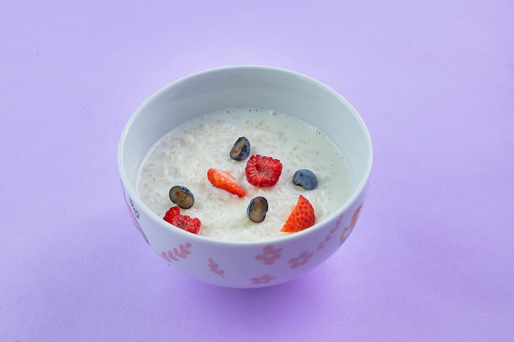 DM rice porridge with berries on the water