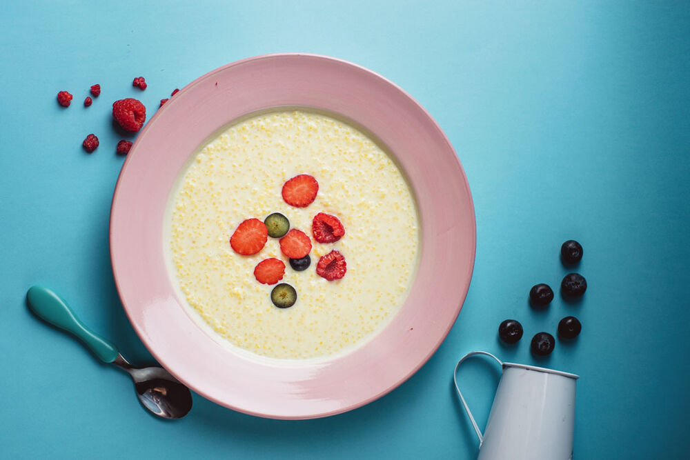 DM millet porridge with berries on the water