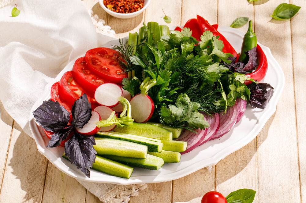 Assorted seasonal vegetables and herbs