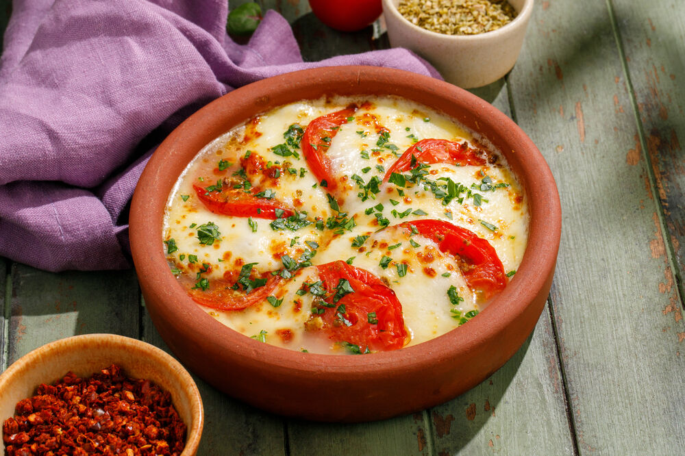 Fried suluguni cheese with fresh tomatoes