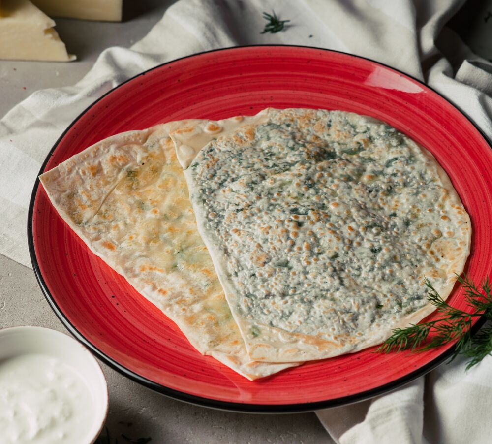 Qutabs with cooking herbs