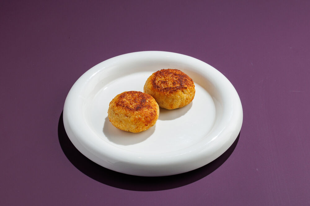 Cutlets from fish with sauce 