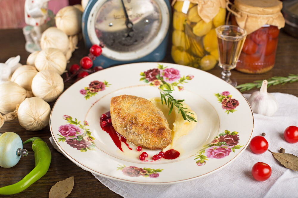 Elk cutlet with sauerkraut and mashed potatoes