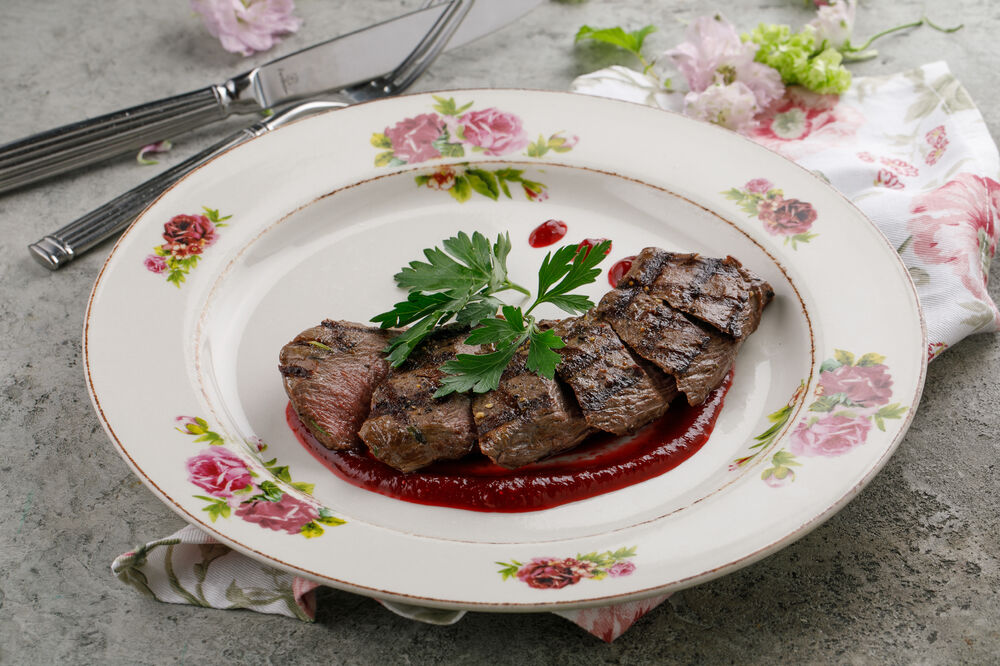 Venison loin with cowberry sauce