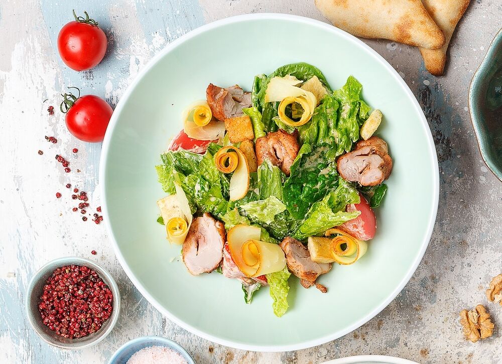 Warm salad with chicken and smoked Suluguni cheese