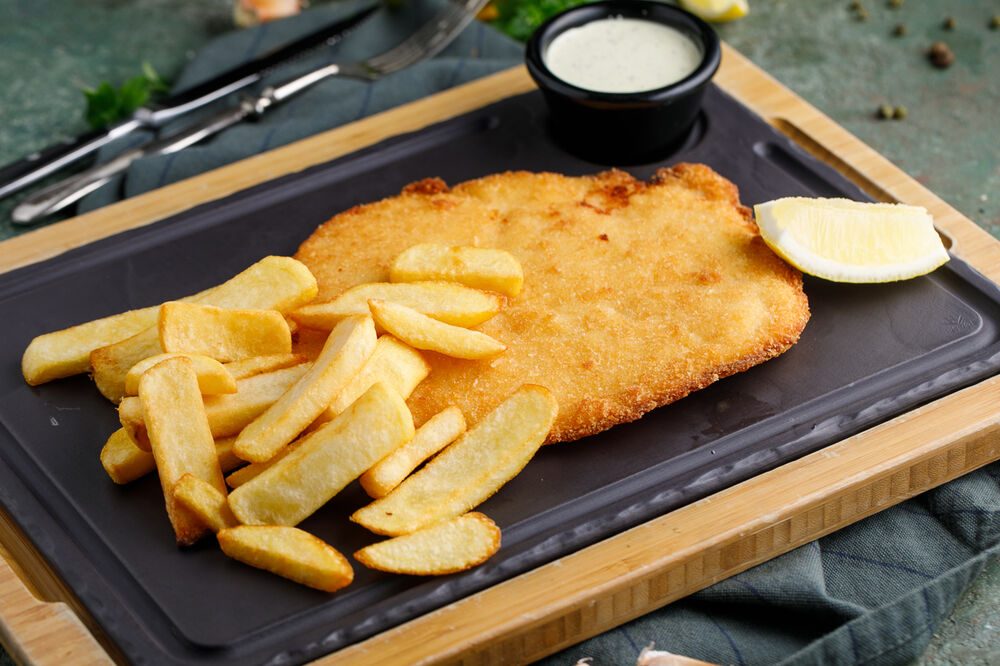 Serbian style schnitzel with potatoes