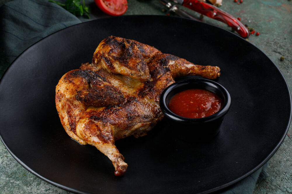Chicken cornichon with sauce Satsebeli
