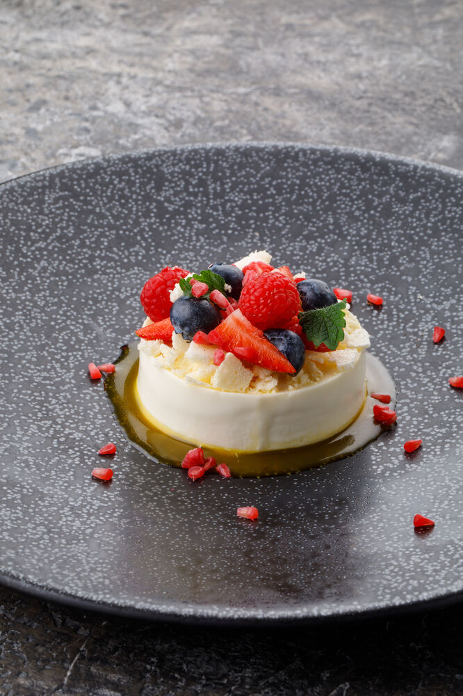 Panna Cotta with passionfruit and berries