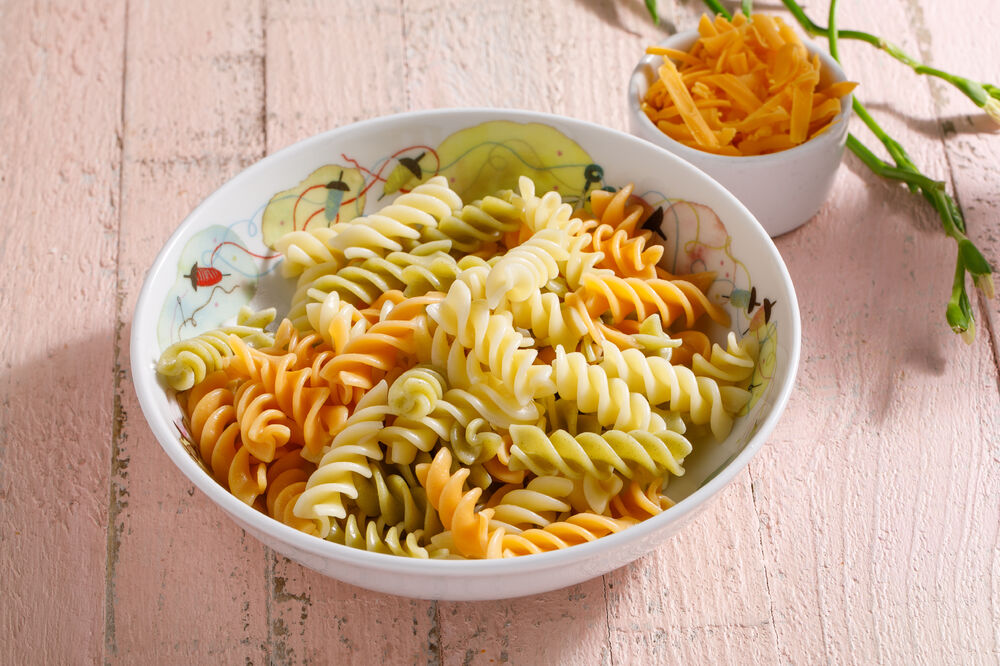 Colored pasta with cheese