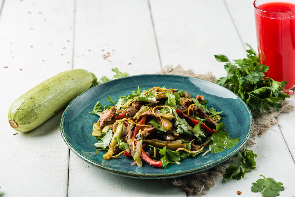 Grilled salad with vegetables and lamb