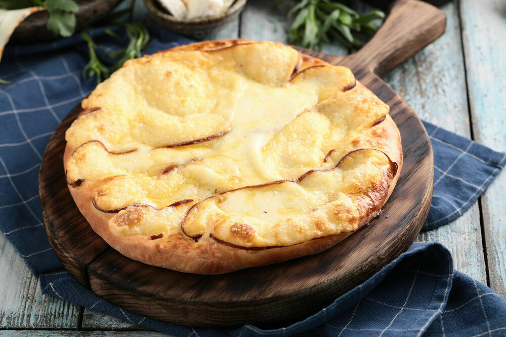 Khachapuri with smoked Suluguni cheese
