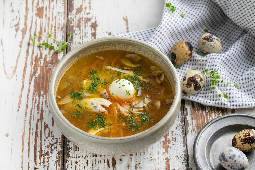 Homemade noodle soup with chicken and mushrooms