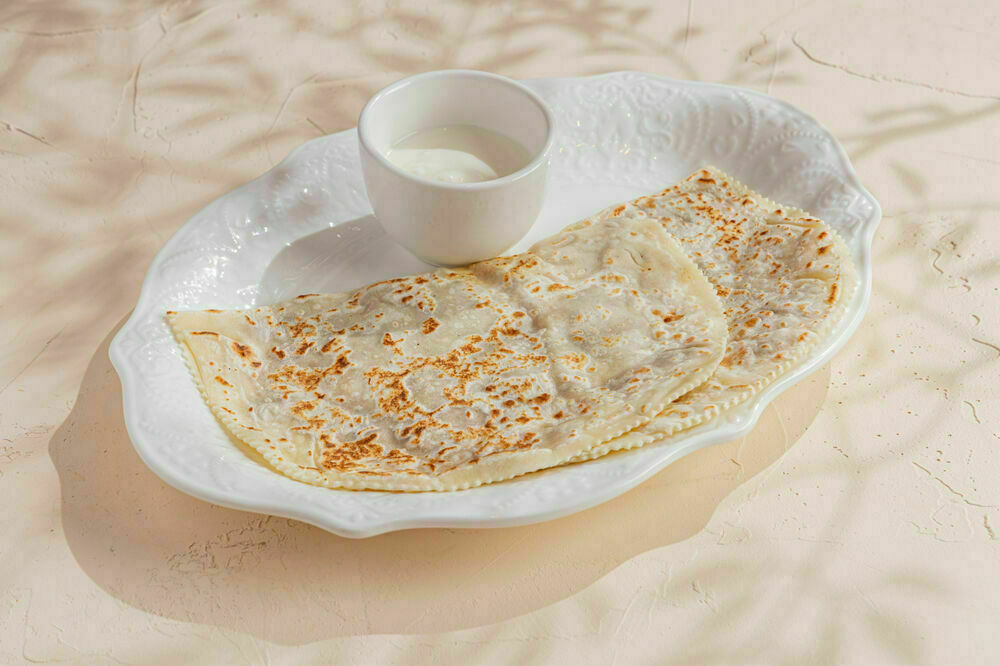 Kutaby with chanterelles and potatoes