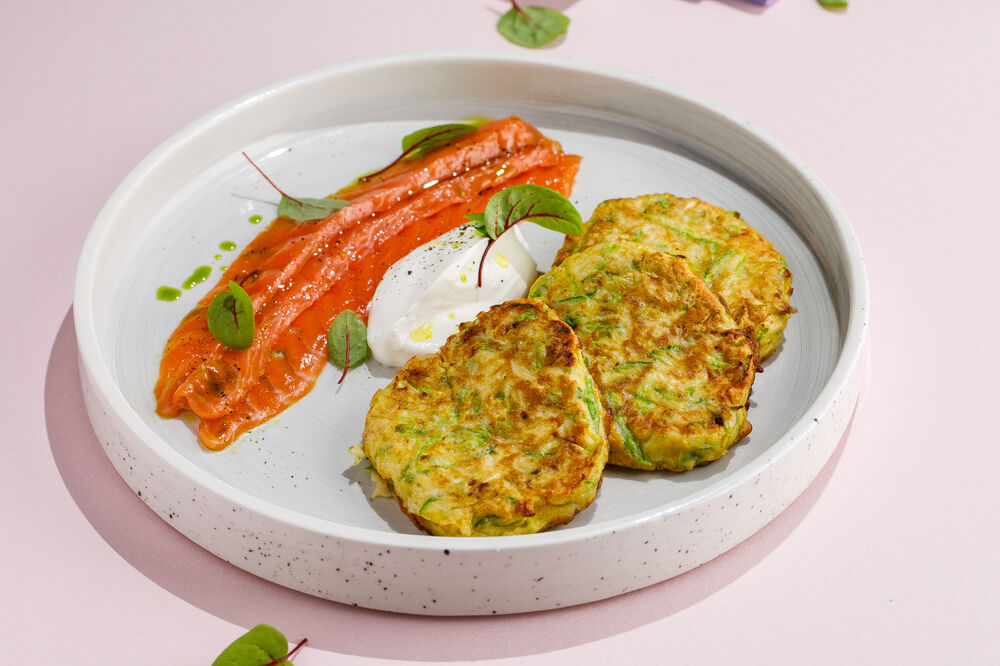 Breakfast zucchini pancakes with salmon