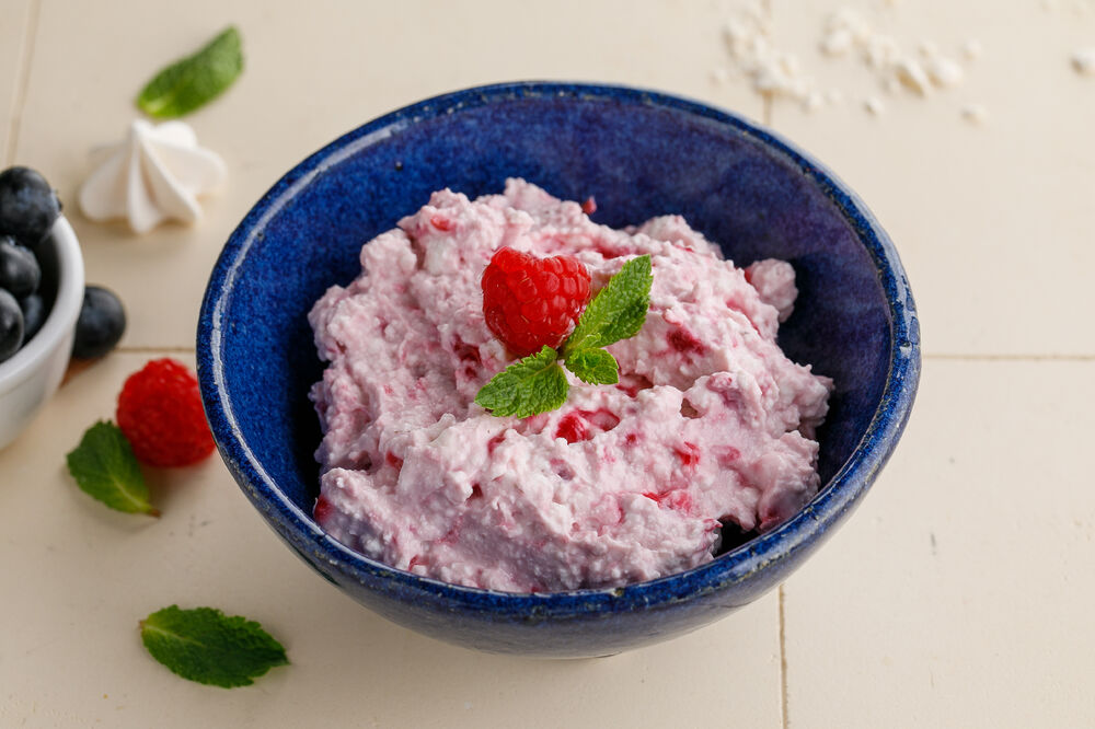 Homemade cottage cheese with raspberry