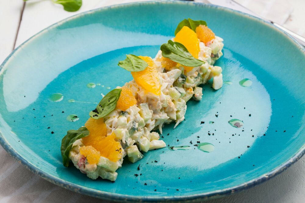 Crab salad with pike caviar and oranges
