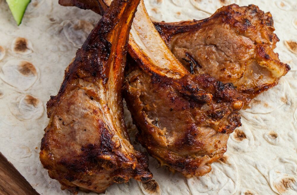 Charcoal grilled lamb ribs