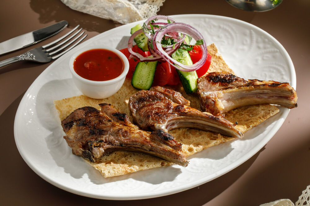 Charcoal grilled lamb ribs