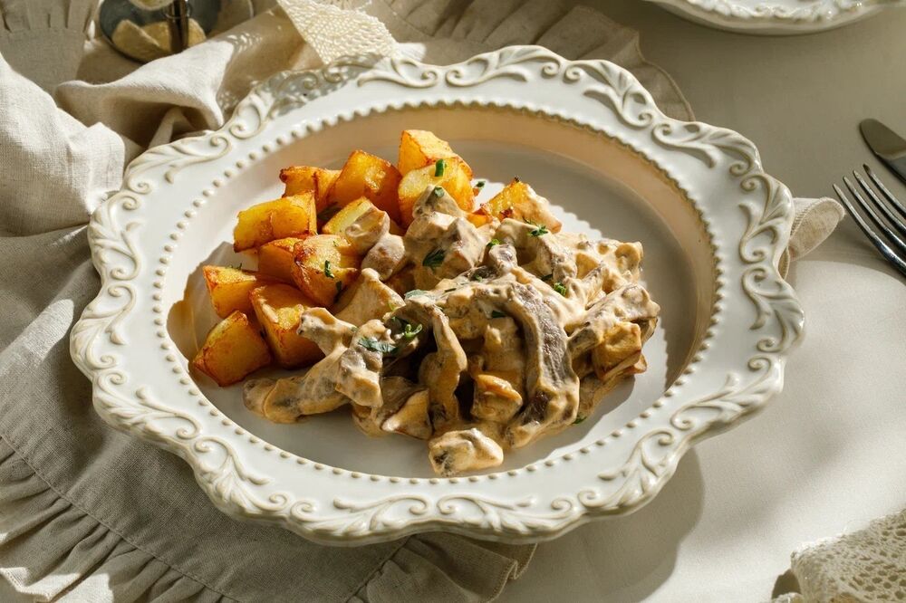 Beef Stroganoff with mushrooms and baked potatoes