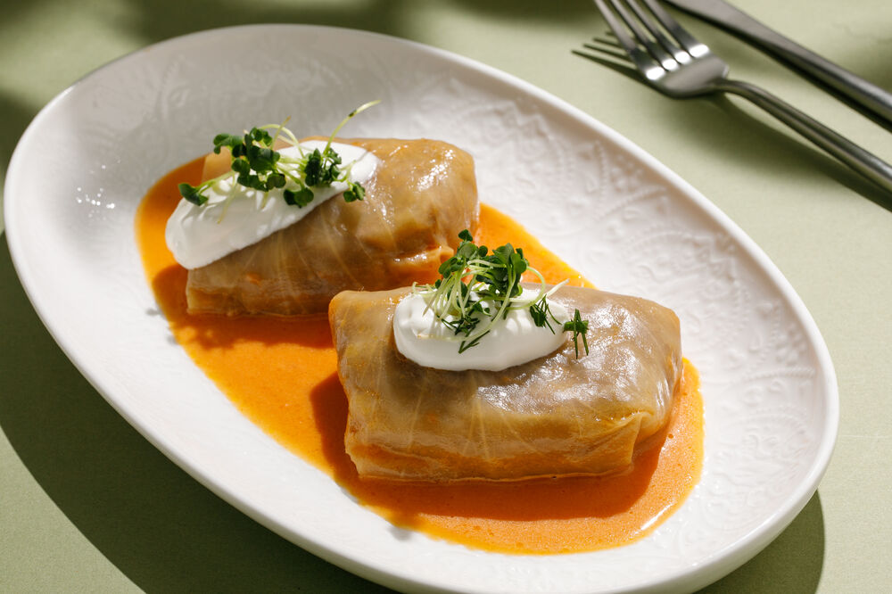 Homemade cabbage rolls with sour cream