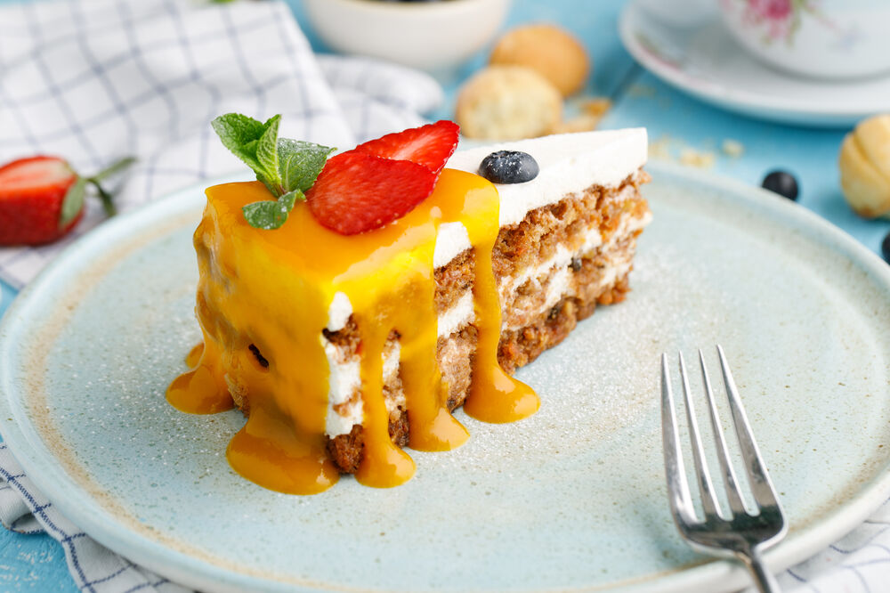 Carrot cake with mango sauce