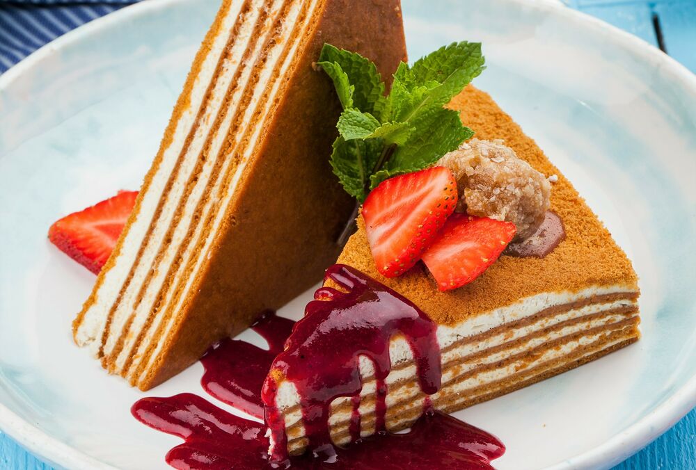 Honey cake with cranberry sauce