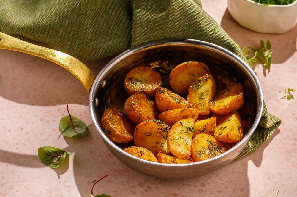 Baked potatoes in herbs