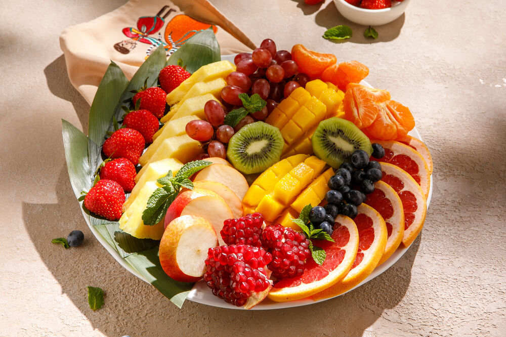 Assorted seasonal fruits with berries