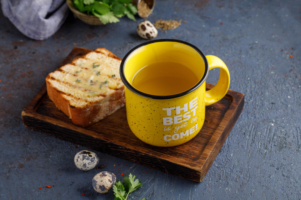 Chicken broth with toasted bread