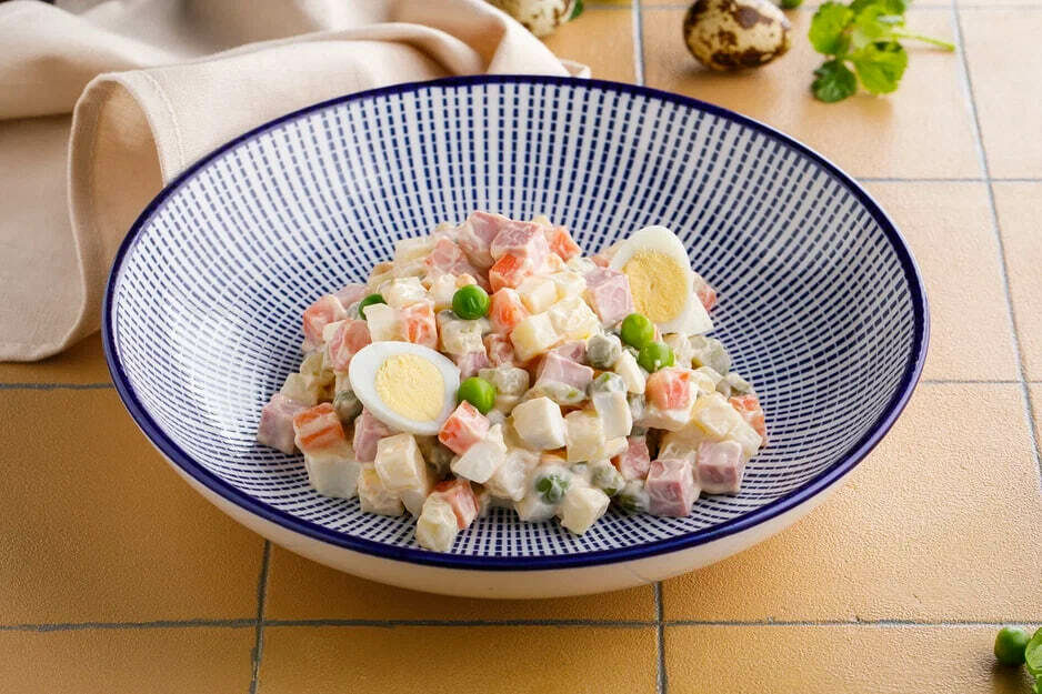 Russian salad with sausage