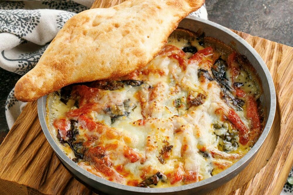 Fried Suluguni cheese with tomatoes