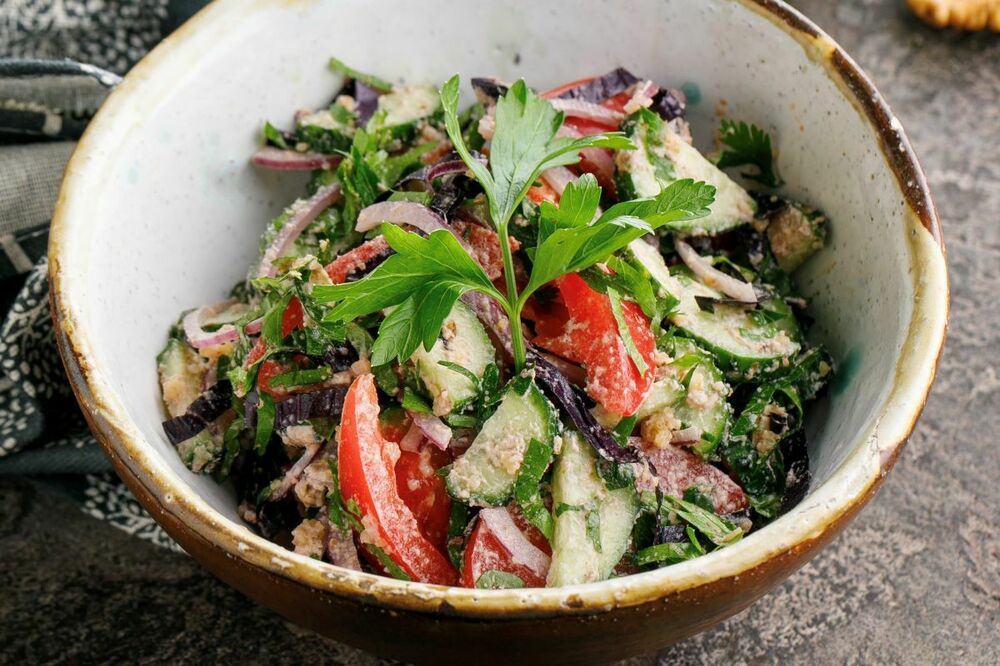 Georgian style vegetable salad with walnuts