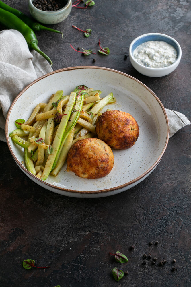 Fish cutlets saute from zucchini