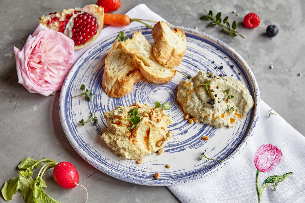 Appetizer of eggplant and hummus with crispy Ciabatta