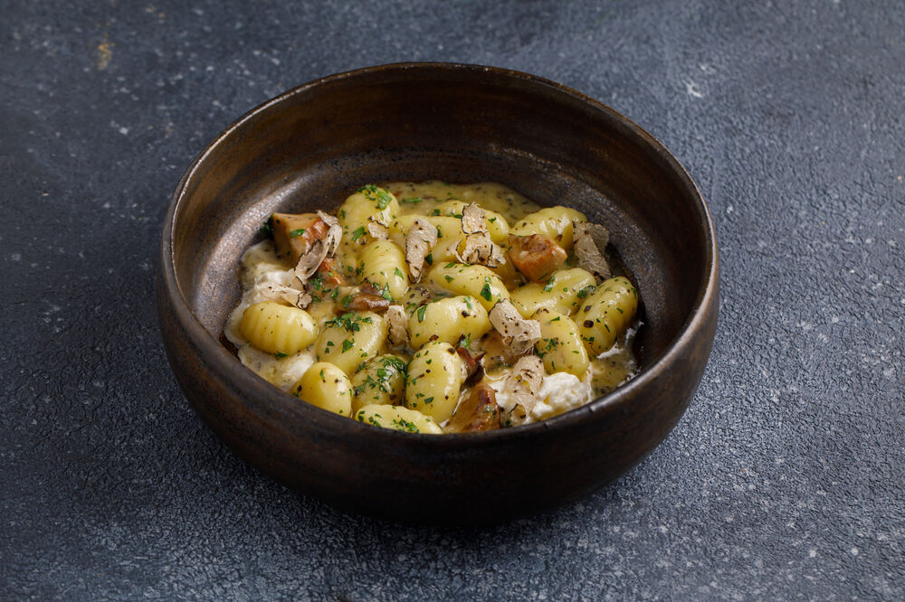 Gnocchi with strachatella and porcini mushrooms