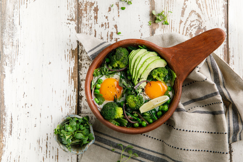Fragrant fried eggs with avocado and herbs