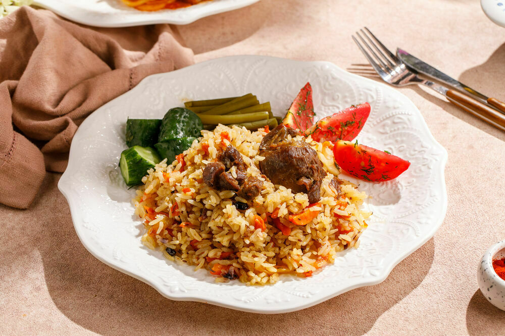 Uzbek pilaf with lamb and pickles