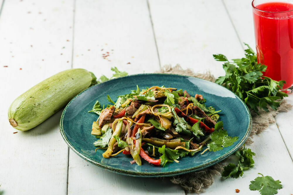 Grilled salad with vegetables and turkey
