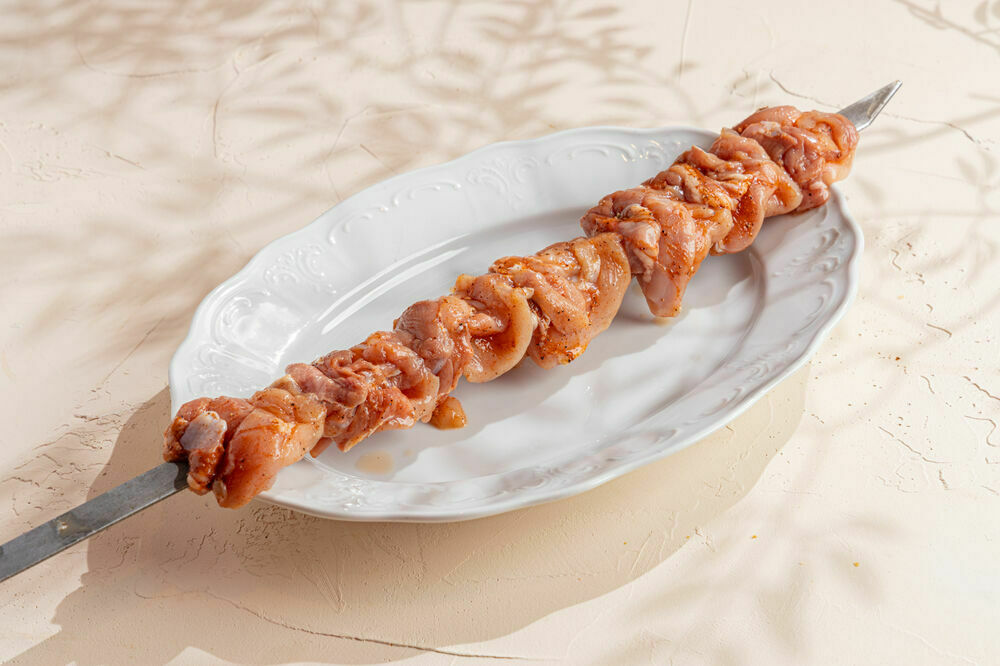 Raw marinated chicken thigh skewer 1 kg