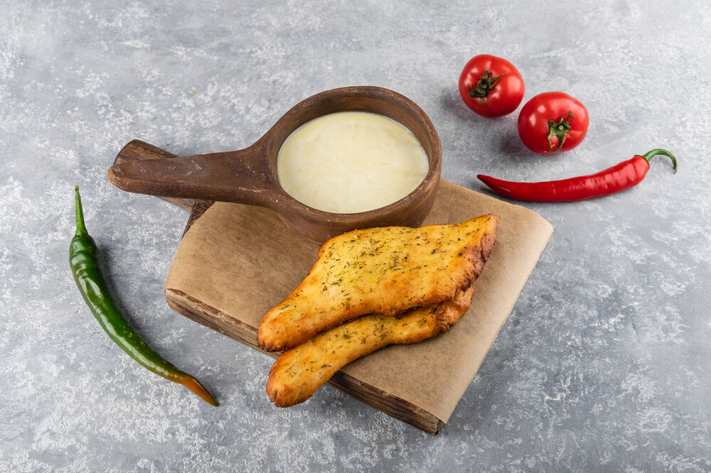 Warm Suluguni with spicy pita bread