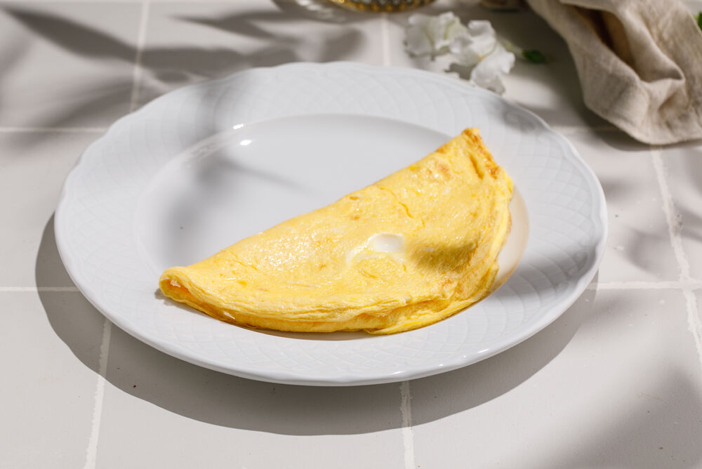 Classic omelet made of three eggs