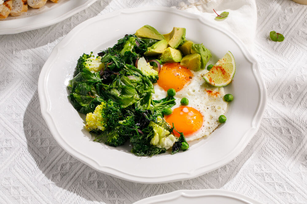 Fragrant scrambled eggs with spicy herbs and avocado