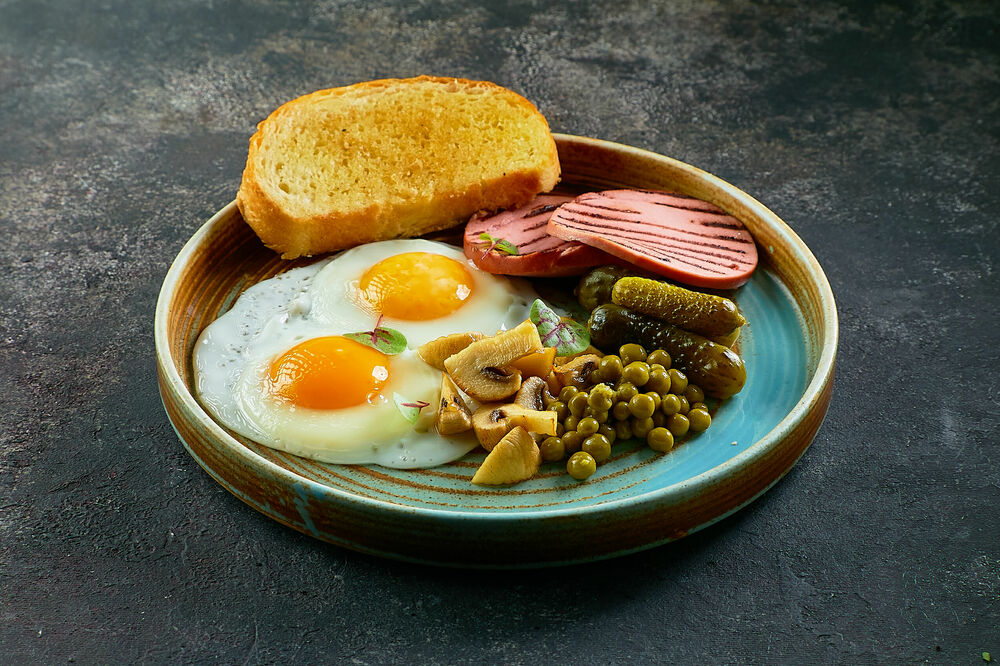 Homemade fried eggs with sausage